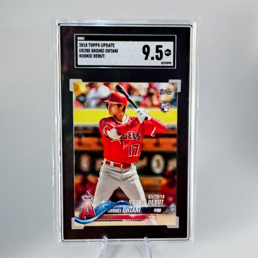 Shohei Ohtani Topps Rookie card Red and Black batting #US285 2018.   Graded SGC